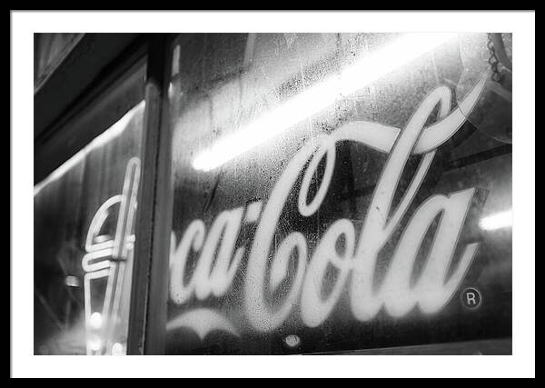 Neon Coca-Cola Sign on Window - Framed Print