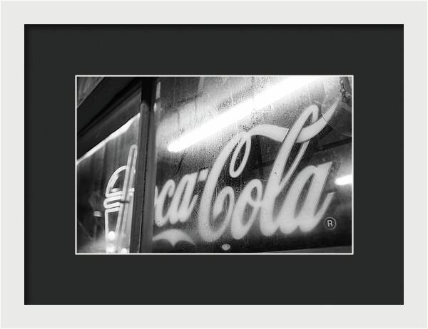 Neon Coca-Cola Sign on Window - Framed Print
