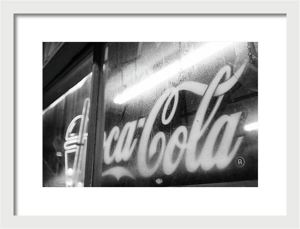 Neon Coca-Cola Sign on Window - Framed Print