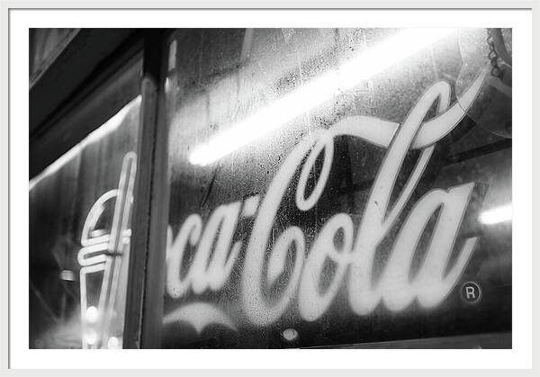Neon Coca-Cola Sign on Window - Framed Print