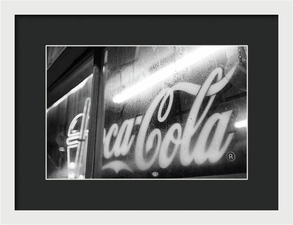 Neon Coca-Cola Sign on Window - Framed Print