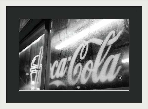 Neon Coca-Cola Sign on Window - Framed Print
