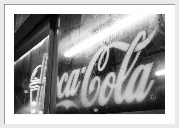 Neon Coca-Cola Sign on Window - Framed Print