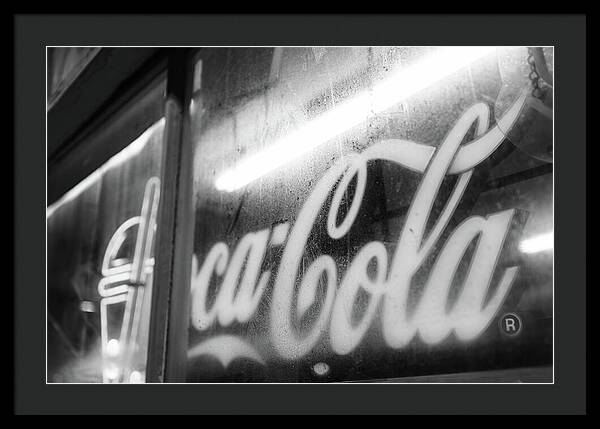 Neon Coca-Cola Sign on Window - Framed Print