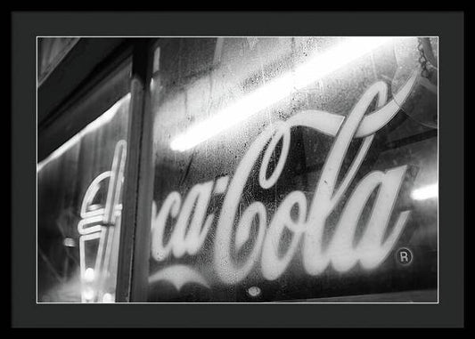 Neon Coca-Cola Sign on Window - Framed Print