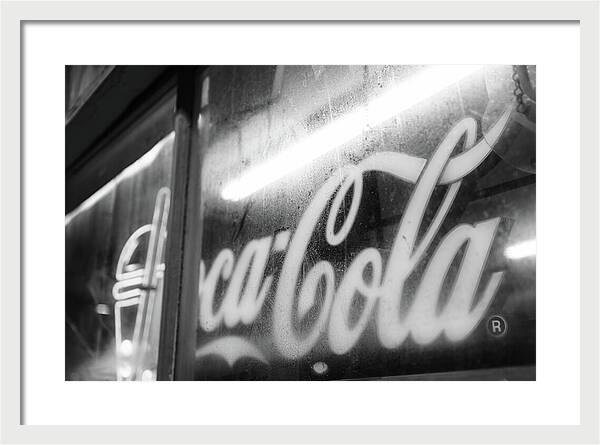 Neon Coca-Cola Sign on Window - Framed Print