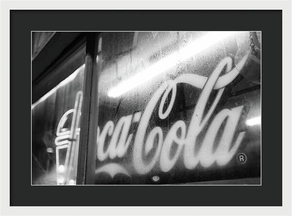 Neon Coca-Cola Sign on Window - Framed Print