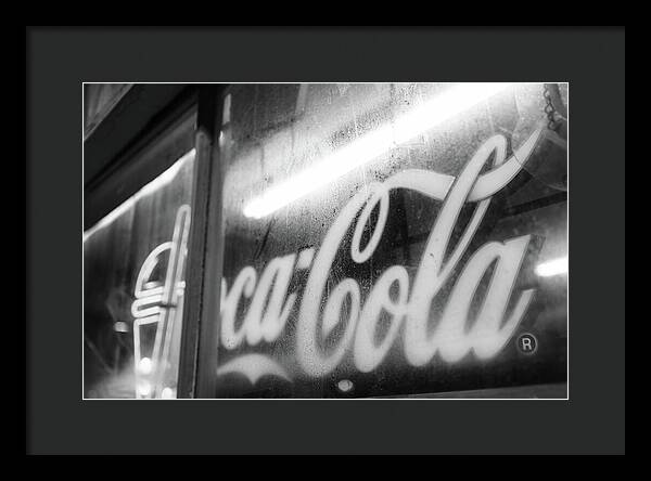 Neon Coca-Cola Sign on Window - Framed Print