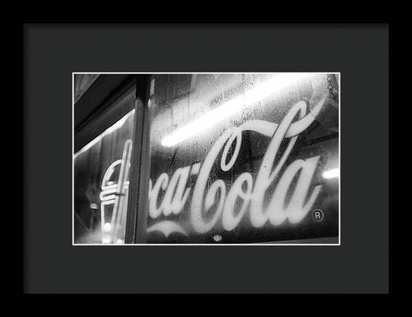 Neon Coca-Cola Sign on Window - Framed Print