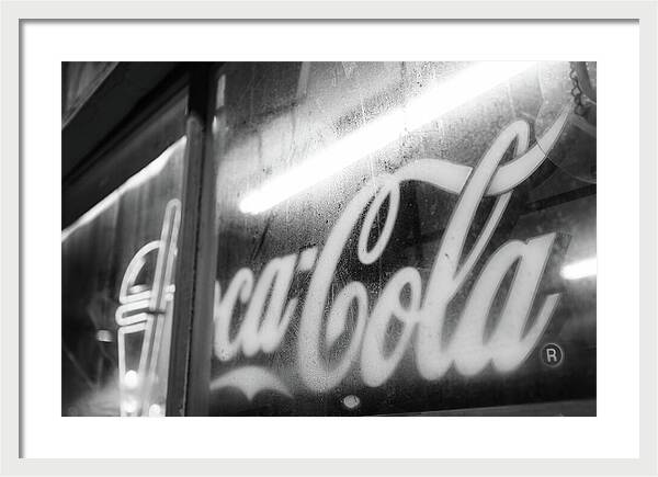 Neon Coca-Cola Sign on Window - Framed Print