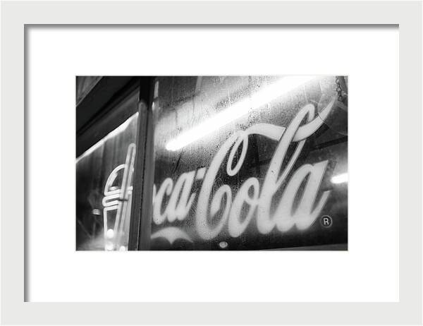 Neon Coca-Cola Sign on Window - Framed Print