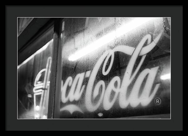 Neon Coca-Cola Sign on Window - Framed Print