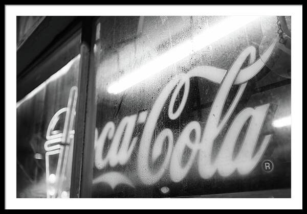 Neon Coca-Cola Sign on Window - Framed Print