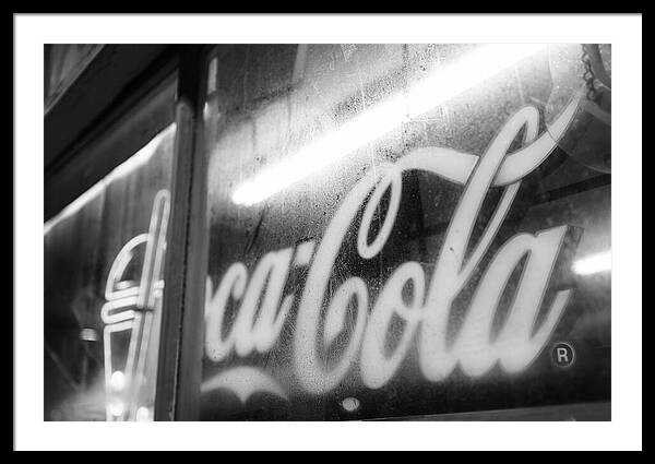 Neon Coca-Cola Sign on Window - Framed Print