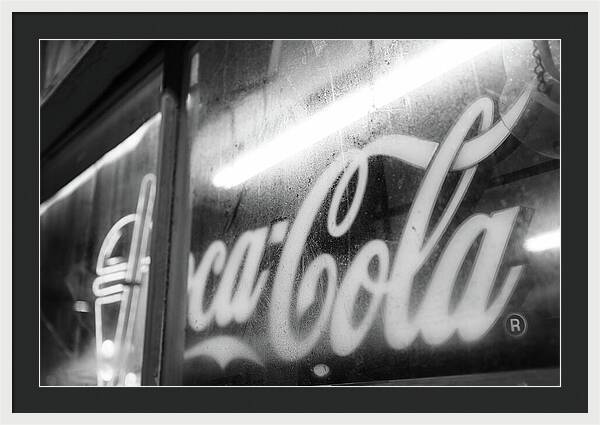 Neon Coca-Cola Sign on Window - Framed Print