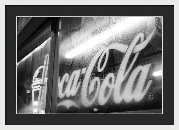 Neon Coca-Cola Sign on Window - Framed Print