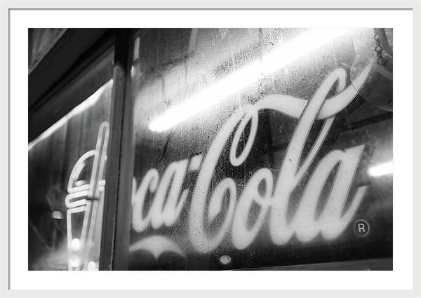 Neon Coca-Cola Sign on Window - Framed Print