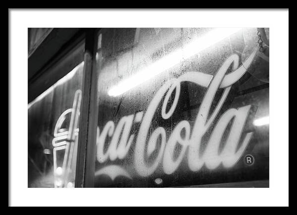 Neon Coca-Cola Sign on Window - Framed Print